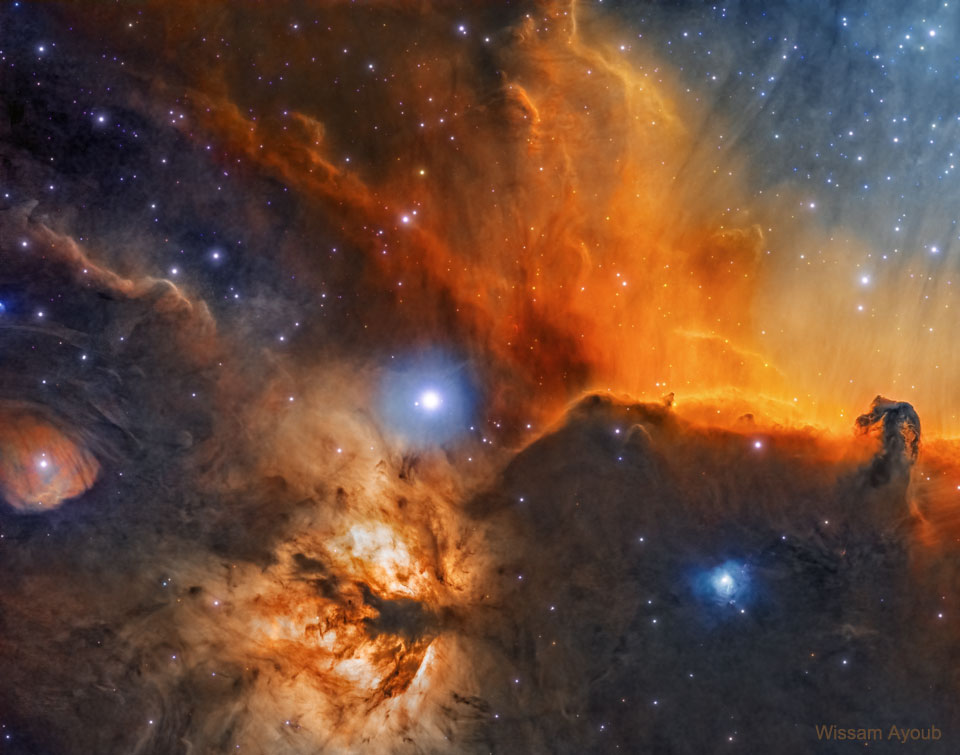 The picture shows a deep image of the part of
the Orion Nebula that features both the Horsehead Nebula
and the Flame Nebula. Detailed surrounding dust and stars
are also visible.
Please see the explanation for more detailed information.