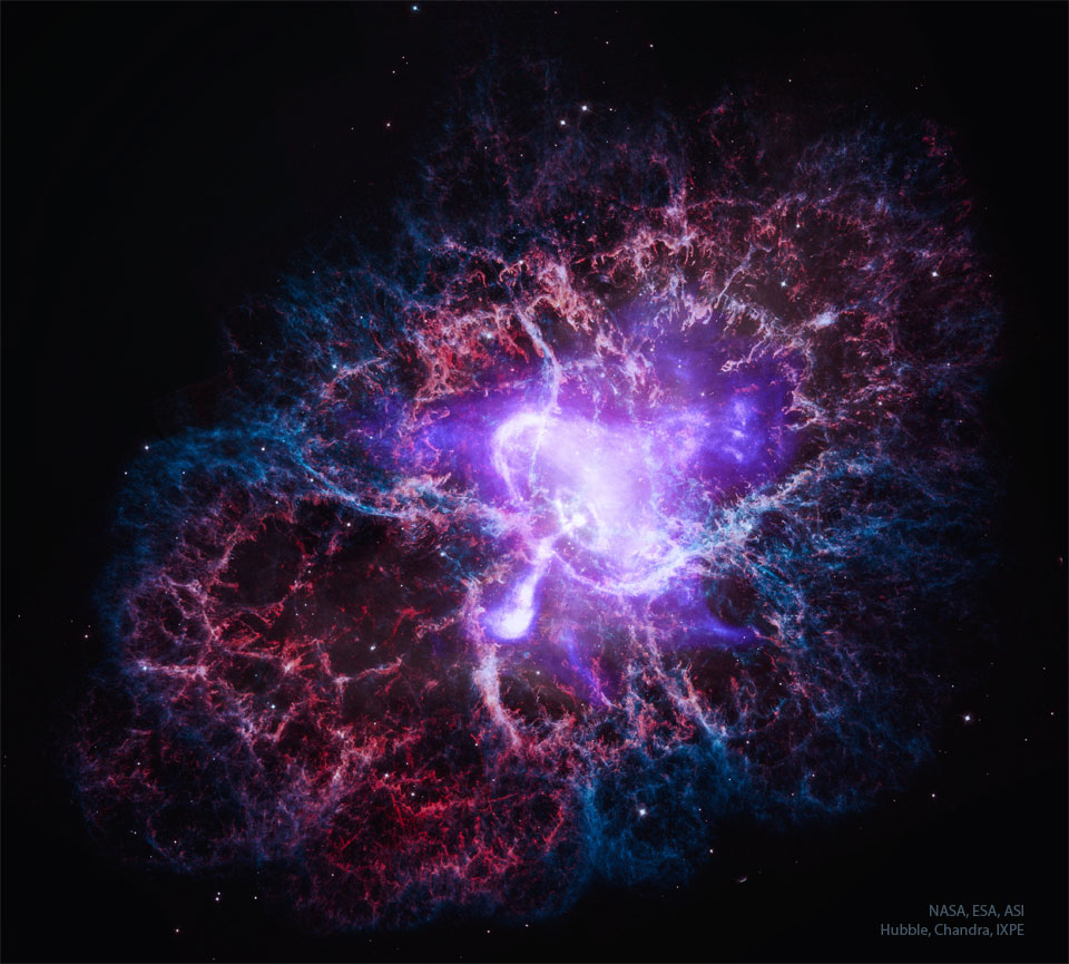 A multi-coloured nebula is shown that is the expanding
remnant of an exploded star. The central white and purple
colours show X-ray light, while the outer red and blue colours
show visible light. 
Please see the explanation for more detailed information.