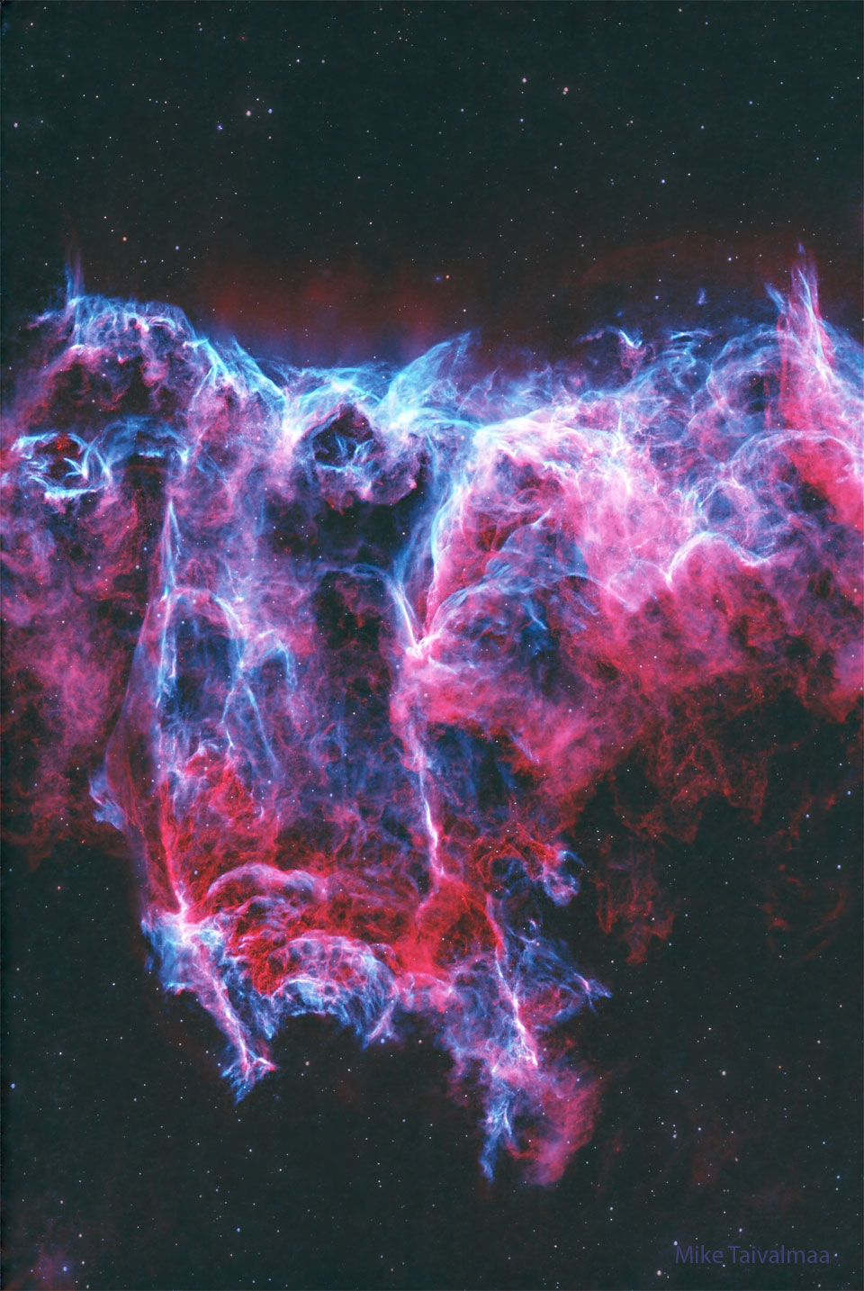 The featured image shows a starfield with a two-
coloured nebula in the centre. The nebula is coloured 
mostly red and blue. 
Please see the explanation for more detailed information.