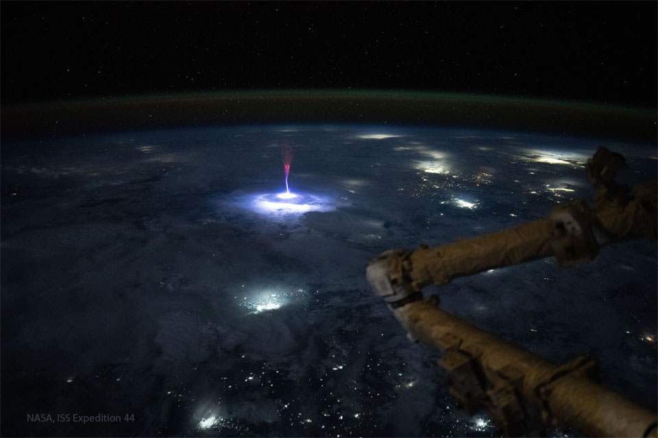 An image of Earth from space shows an unusual 
multi-coloured jet in the middle of the frame.  
Please see the explanation for more detailed information.